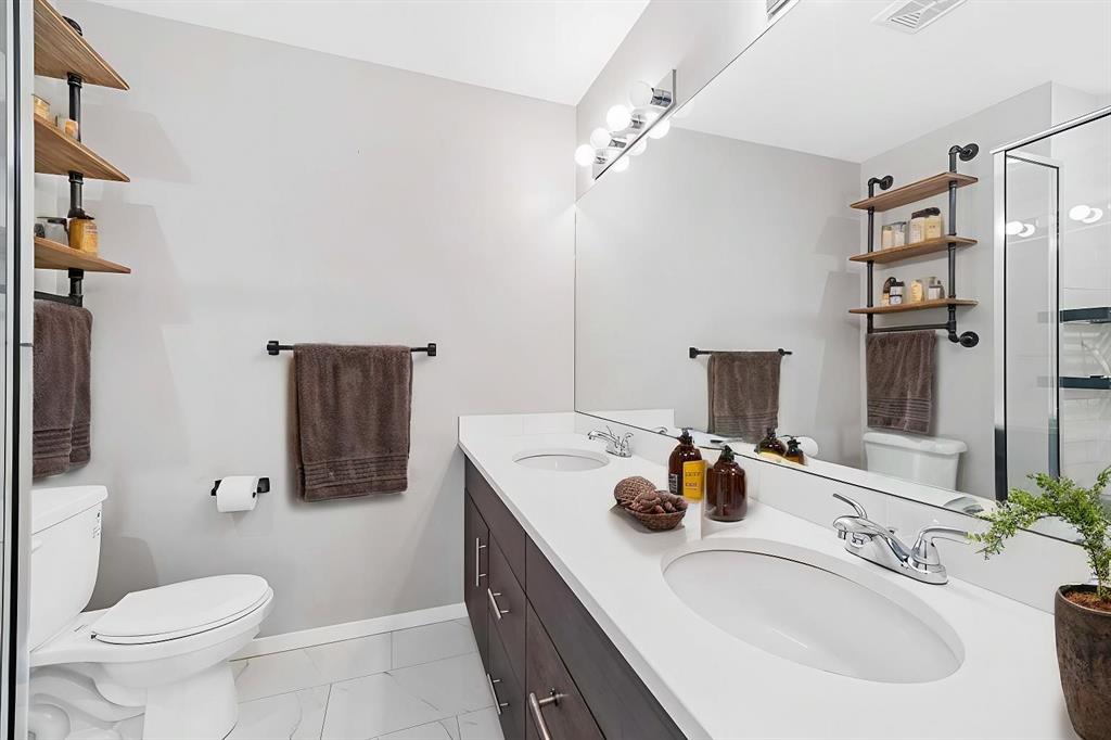 Master ensuite vanity with large mirror and storage