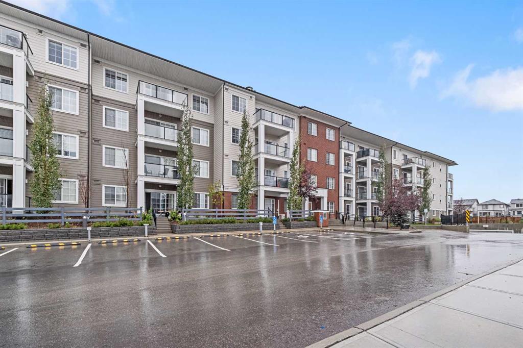 Modern low-rise Sage Meadows Park condo exterior with balconies and on-site parking