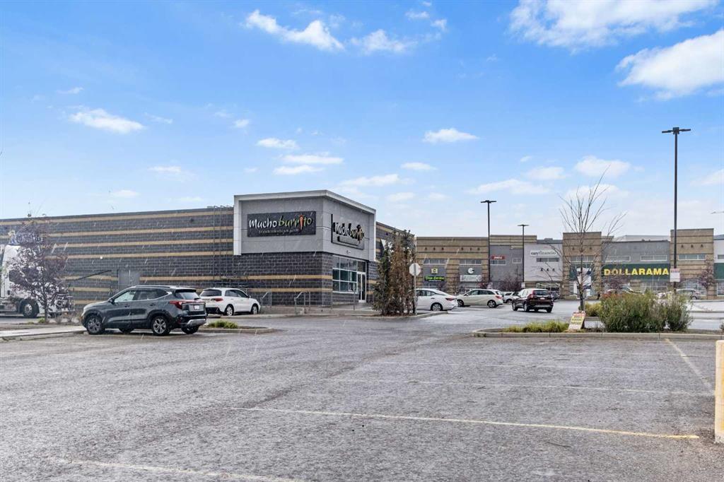 Nearby shopping plaza with Mucho Burrito and Dollarama close to Sage Meadows Park condo